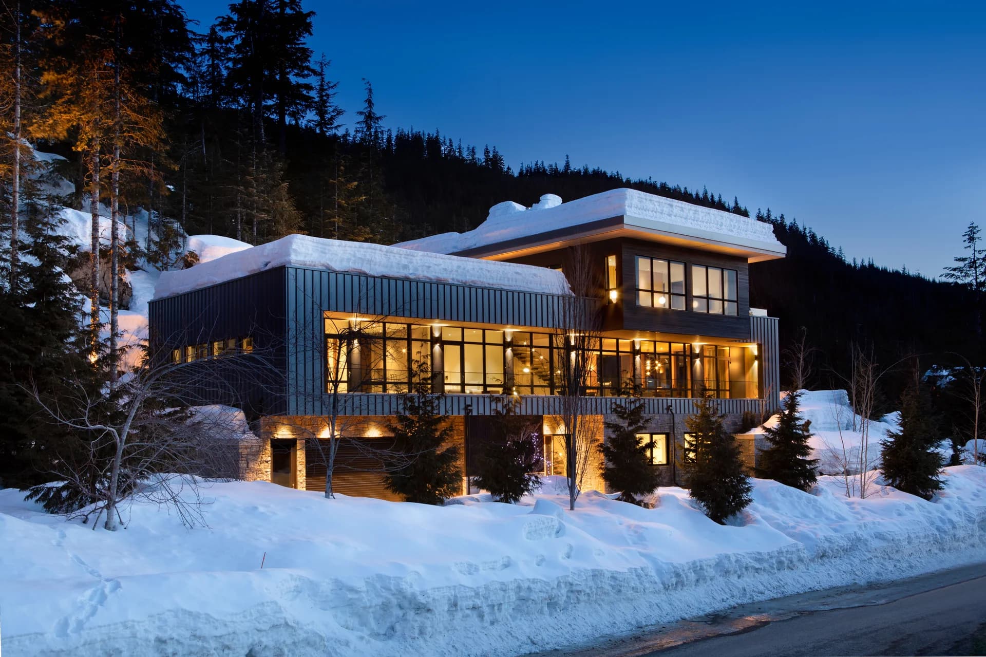 Snow-covered luxury ski home of the kind AceHost manages in mountain markets